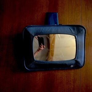 Infant back seat car mirror with plastic film still on mirror